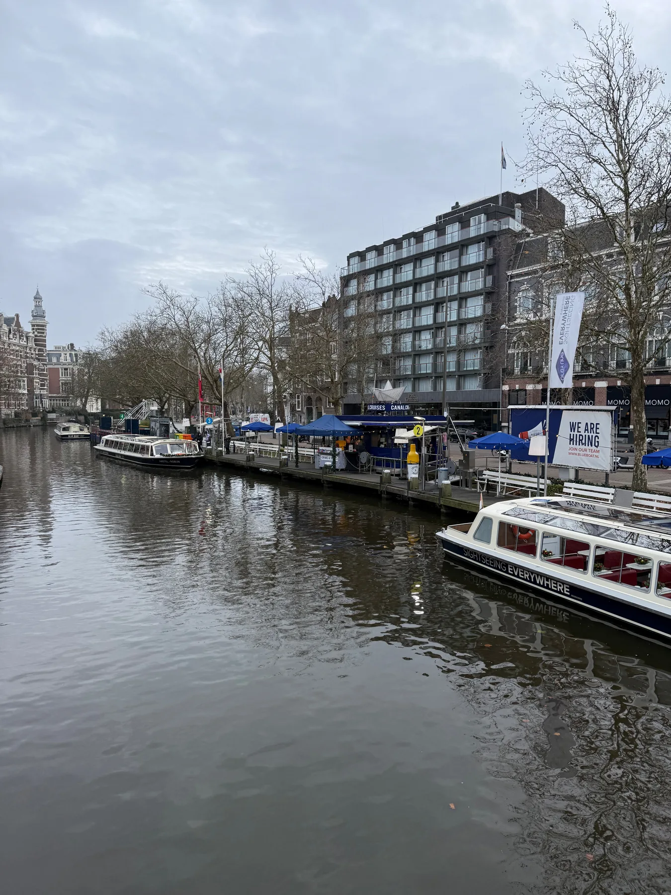 Boats and buildings along an Amsterdam canal