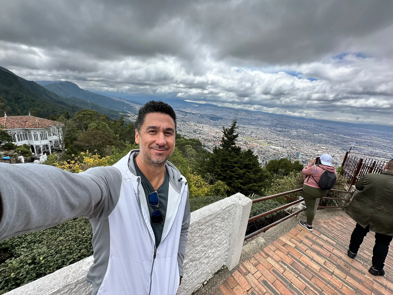 Portrait overlooking Bogotá from a hillside