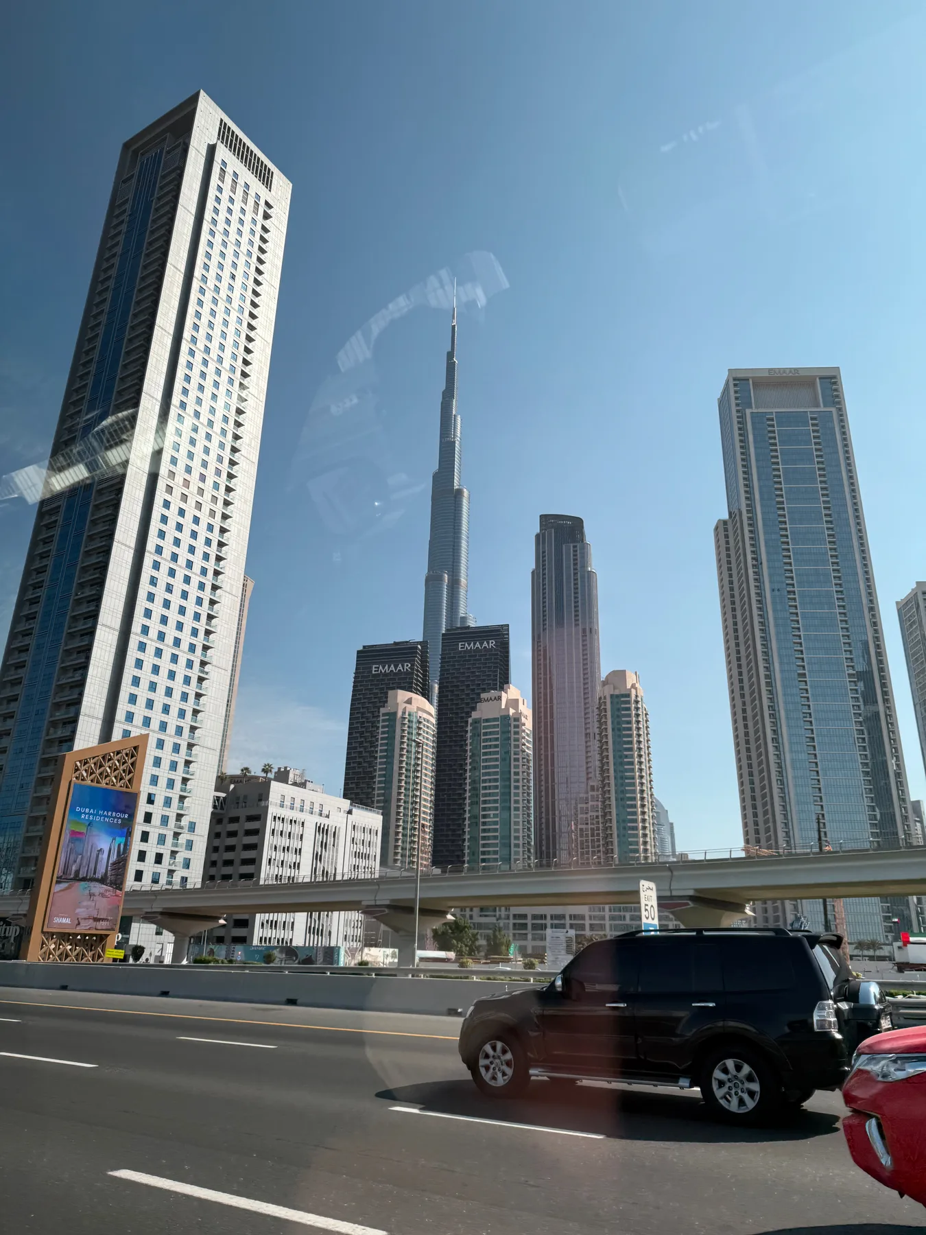 Dubai skyline with the Burj Khalifa seen from the road