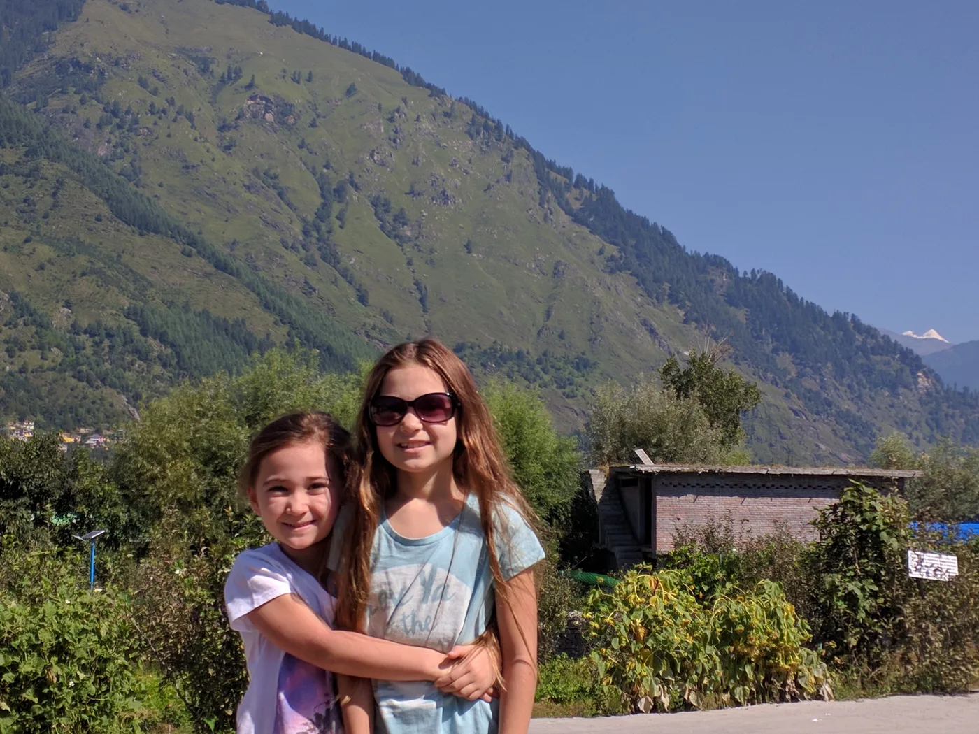 Two sisters outdoors in the Manali mountains