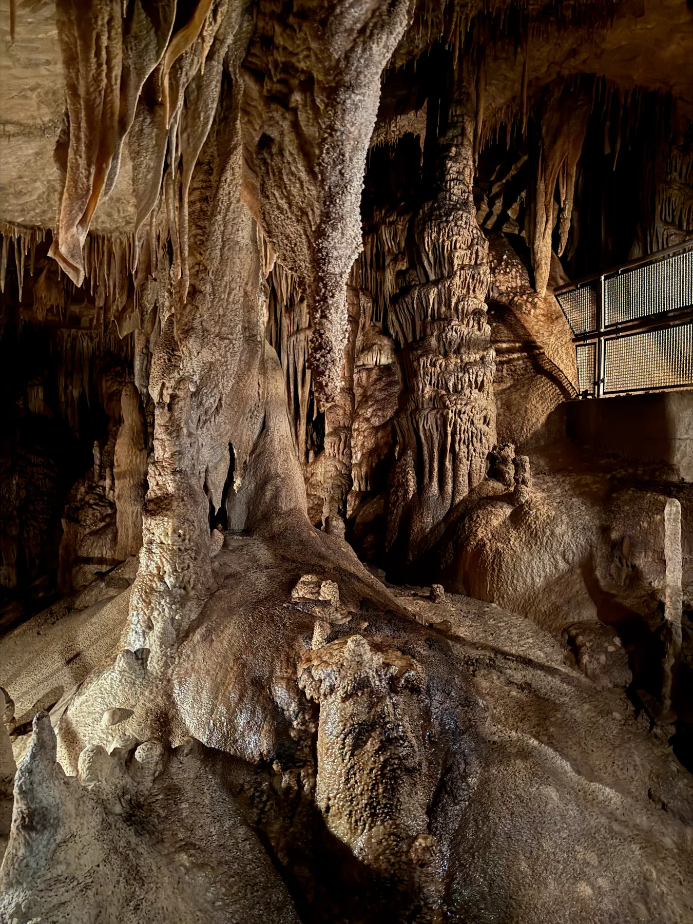 Illuminated cave formations in Cub Run
