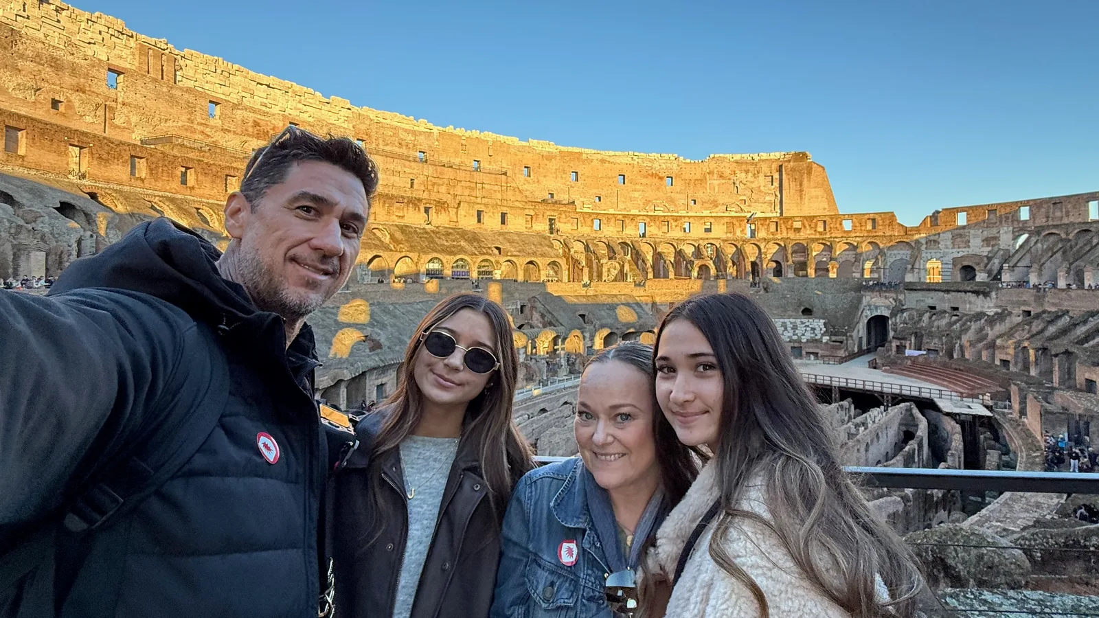 Josh and family inside the Colosseum in Rome