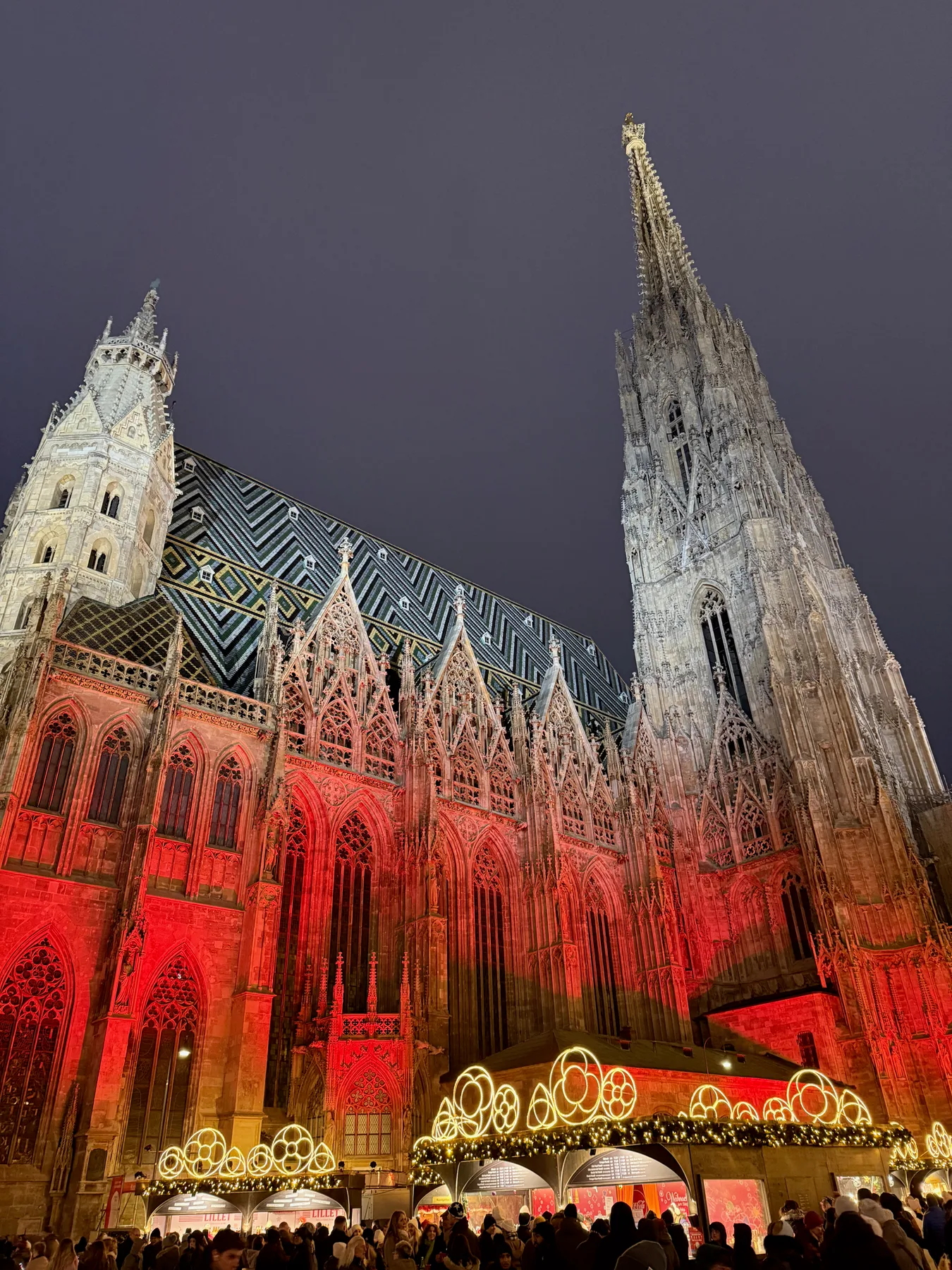 Cathedral exterior illuminated in red at Stephansplatz