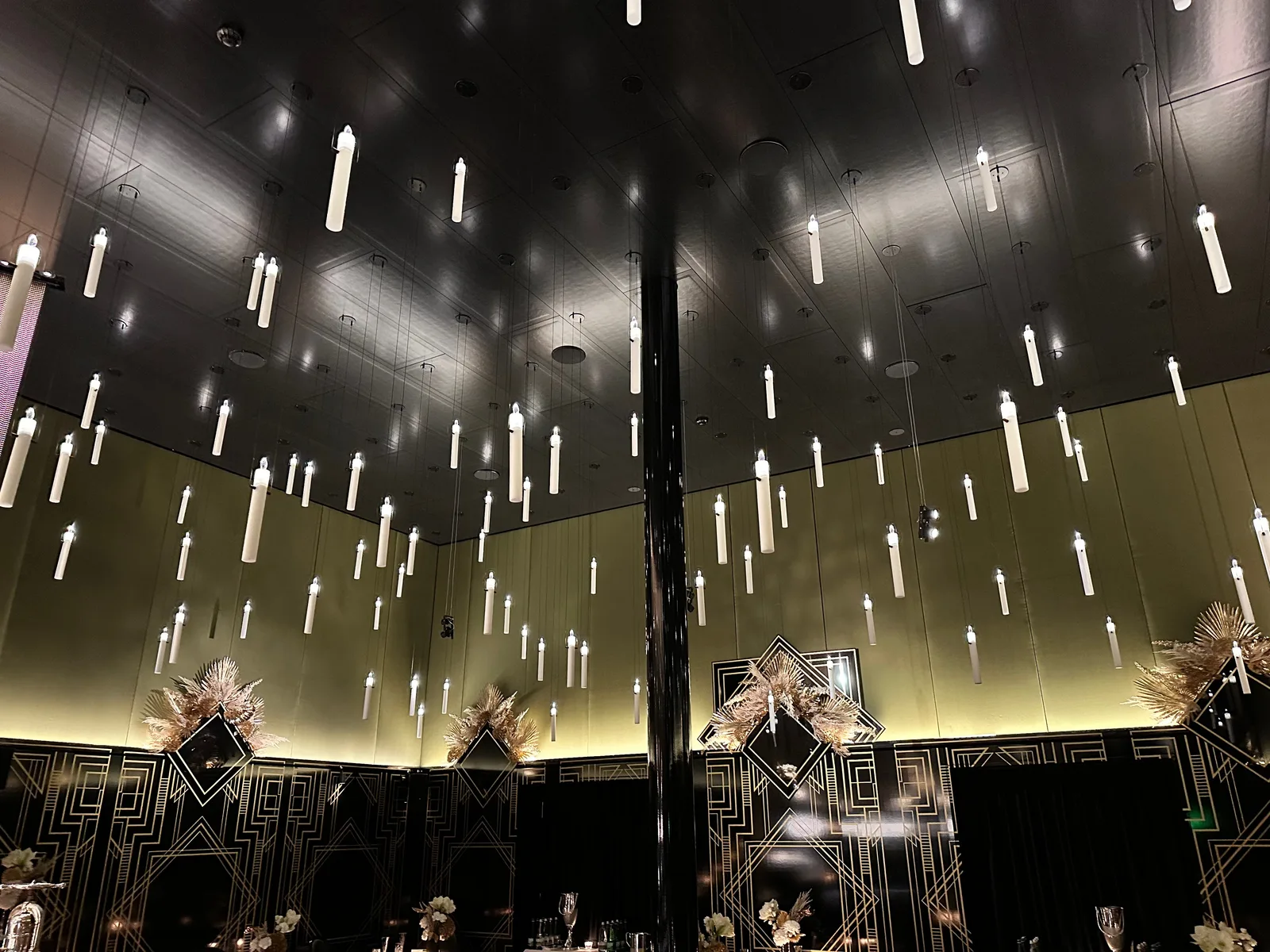 Hanging lights reflected in a dark interior
